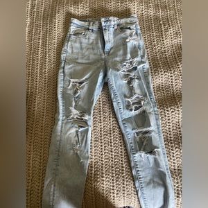 NEVER WORN!! American eagle light wash skinny jeans. Size 4